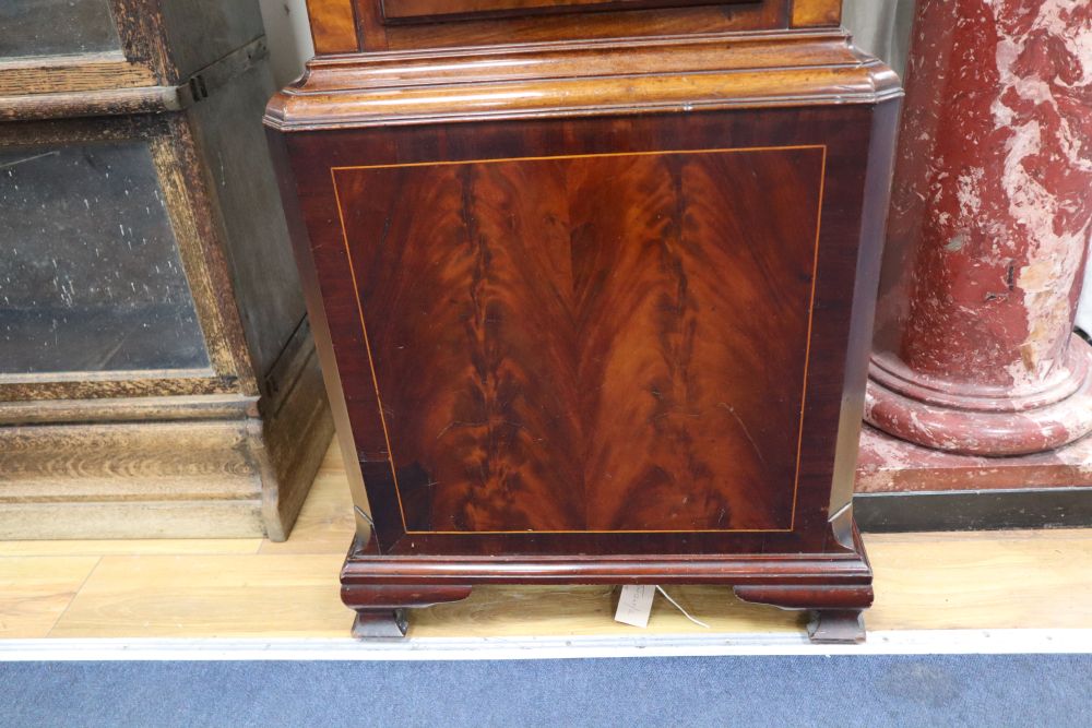 A George III mahogany longcase clock, having thirty-hour movement with 14 inch square dial signed Wm.